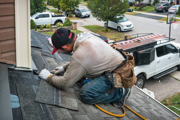 Professional Roof Replacement technician working in Freedom, NH